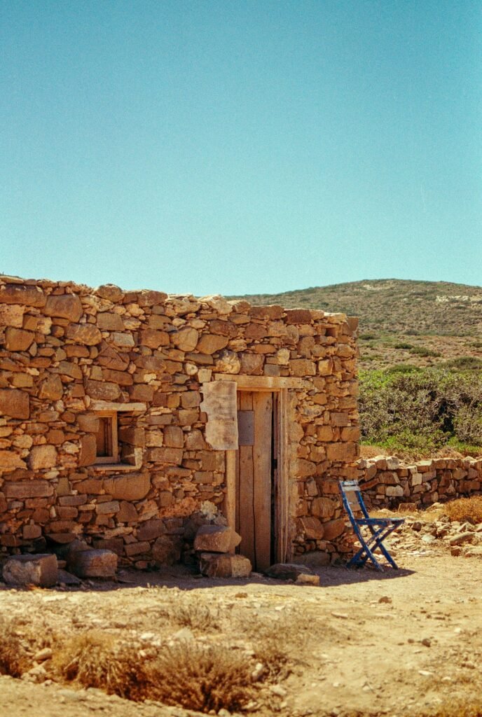 Stone house with a chair