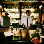 Bartender behind the bar