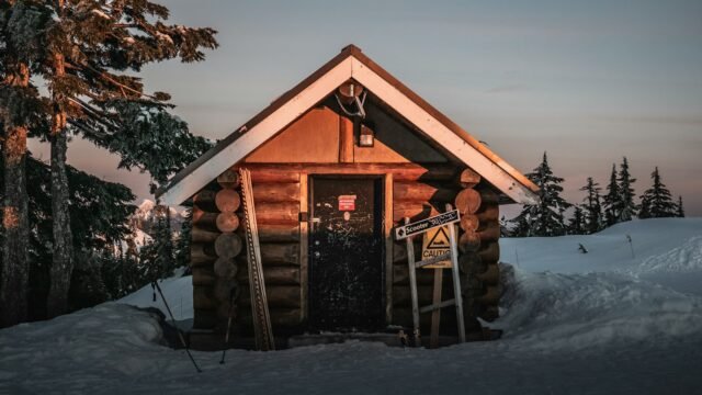 Wooden house in the snow